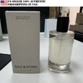 Salt & Stone perfume bottle and packaging on a table